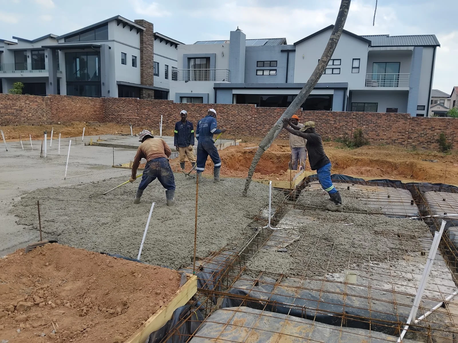 Construction team collaborating on-site